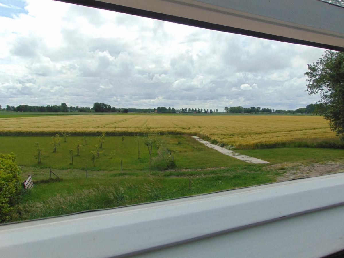 Polderhuis voor 8-10 personen aan zee Nieuwvliet Buitenkant foto